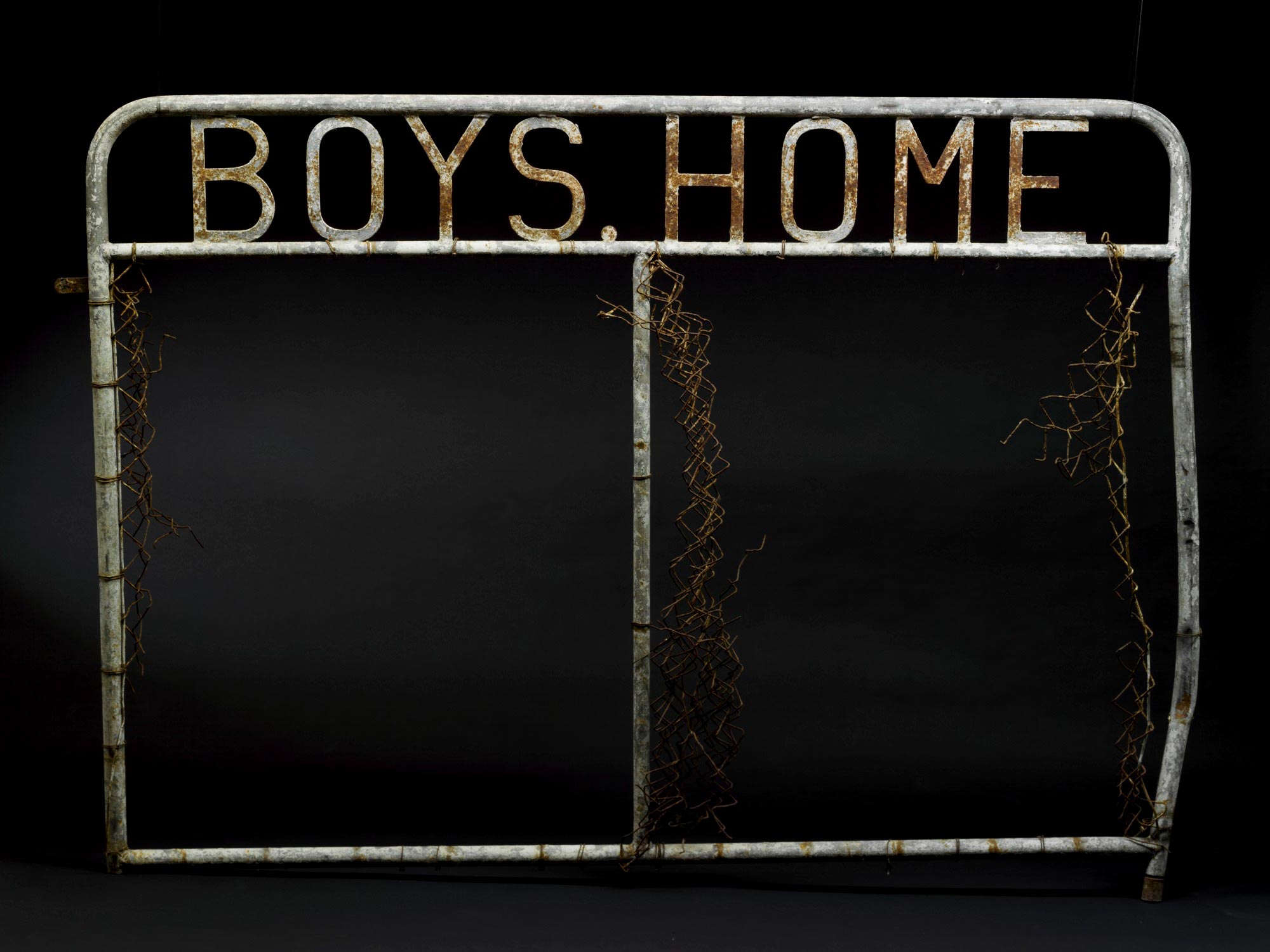 <p>One of the original front gates from the Kinchela Aboriginal Boys Training Home,&nbsp;established by the Aboriginal Protection Board in 1924.&nbsp;The gates were discarded and replaced in about&nbsp;1950.&nbsp;In the late 1990s a community member found this gate by the Macleay River in Kempsey.</p>
