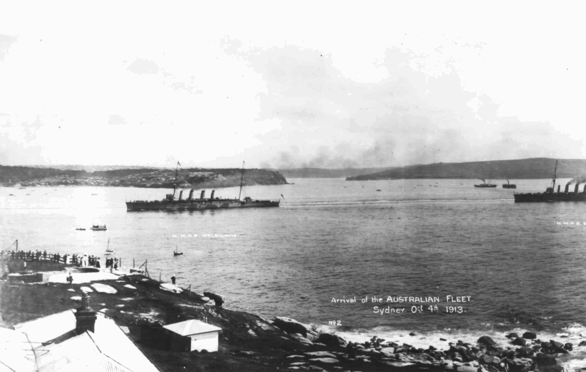 The new Royal Australian Navy ‘fleet unit’ sails into Sydney Harbour.